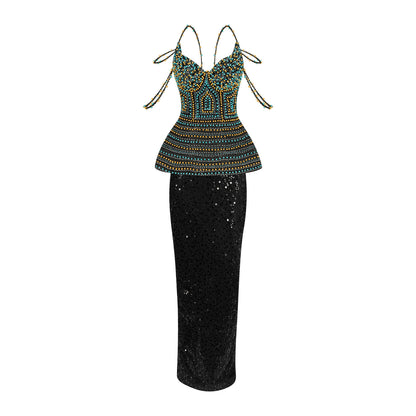 "Sparkle and shine in our African Galactic Sunset Dress! This bold, fully beaded corset top dress will make you stand out in any crowd. The sequinned straight maxi skirt adds an extra touch of glamour. Get ready to take on any adventure in this daring and eye-catching dress!"