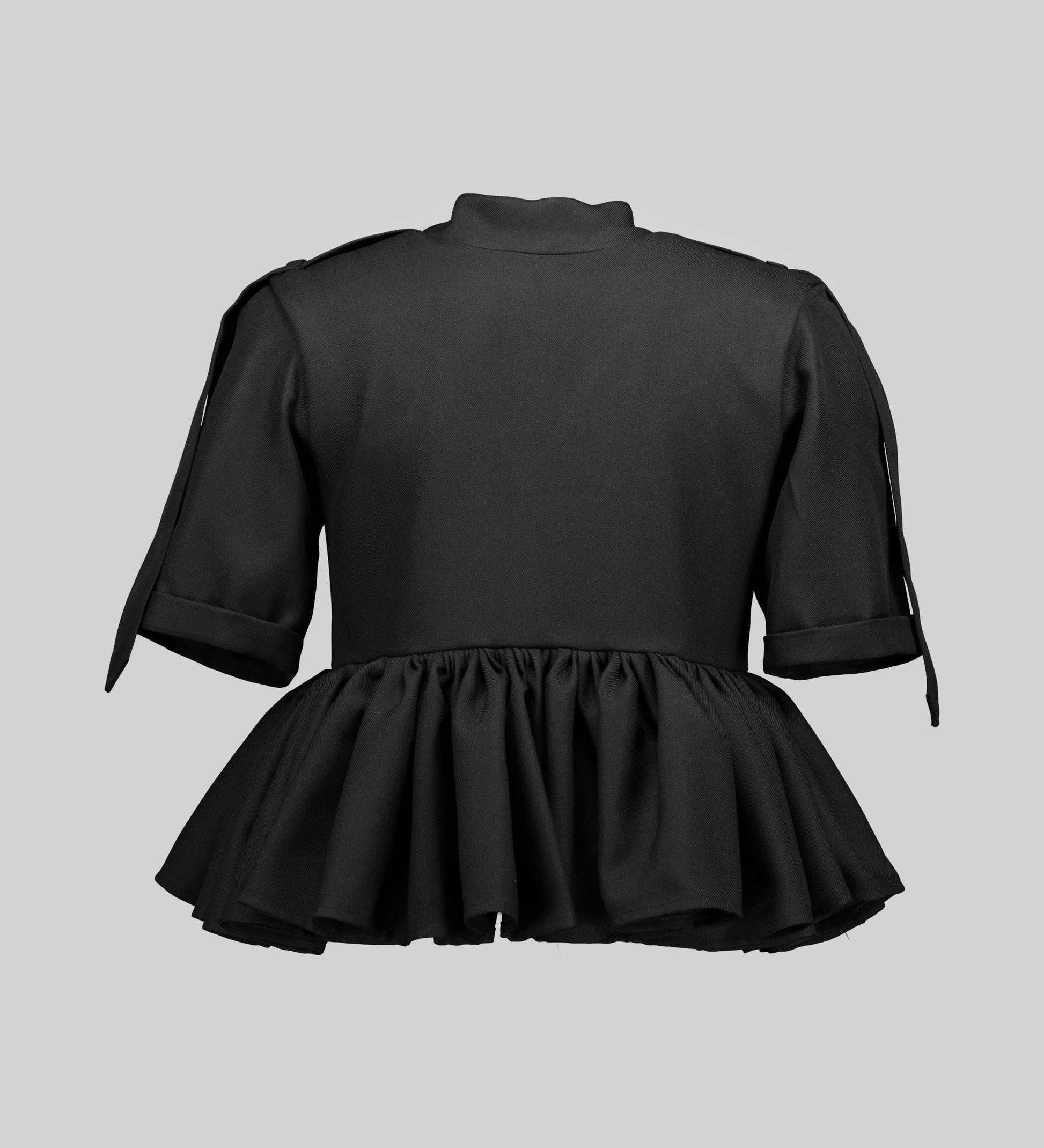 Front View of The Short Sleeved Milli Peplum Top Black by AFI Privé