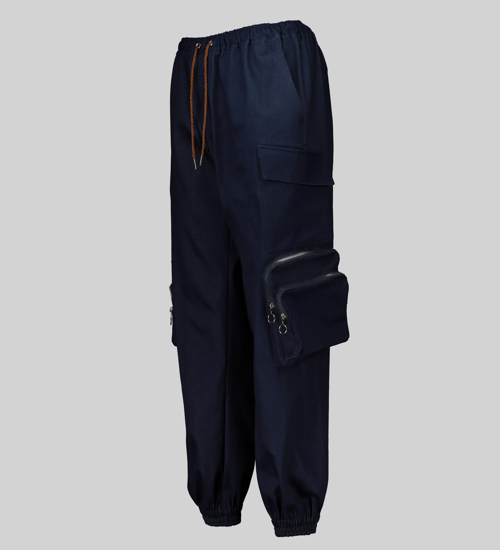 AFI Privé Military Cargo Pants in a jogger style, featuring a drawstring and side zip pockets. Shown from the side.