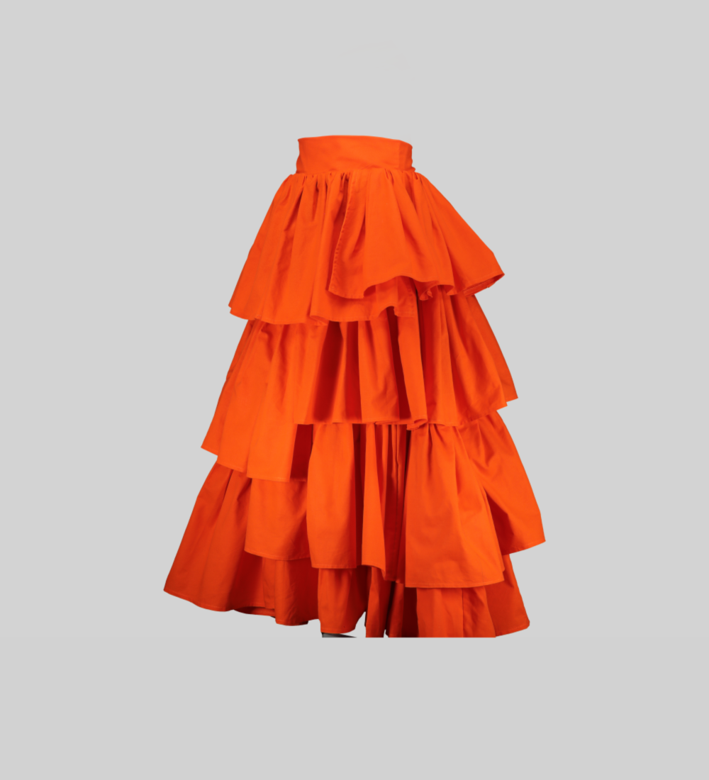 asymmetrical tiered ruffle skirt in orange, showcasing the NTOBEKO XIBELANI design by Bathini Kowane