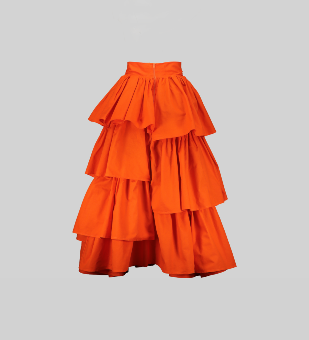 Back view of the orange NTOBEKO XIBELANI SKIRT by Bathini Kowane, highlighting the cascading ruffled tiers