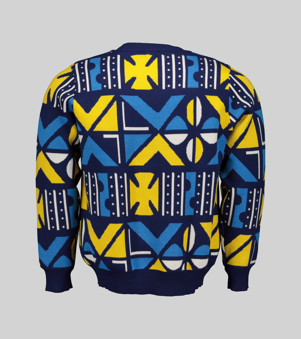 Blue and yellow cowry print knit sweater - back view. Long sleeved