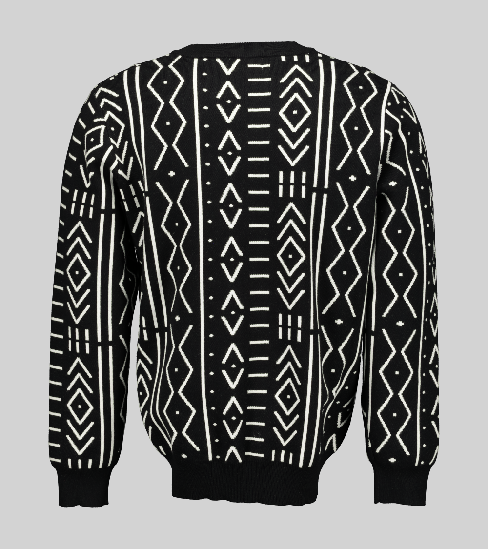 Black and white African print knit sweater with a boxy fit and long sleeves.