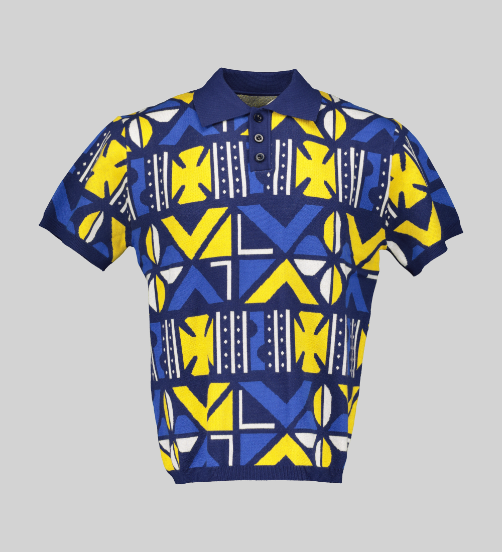 lue and yellow viscose knit golfer with a boxy silhouette, showcasing the full blanket cowry print design.