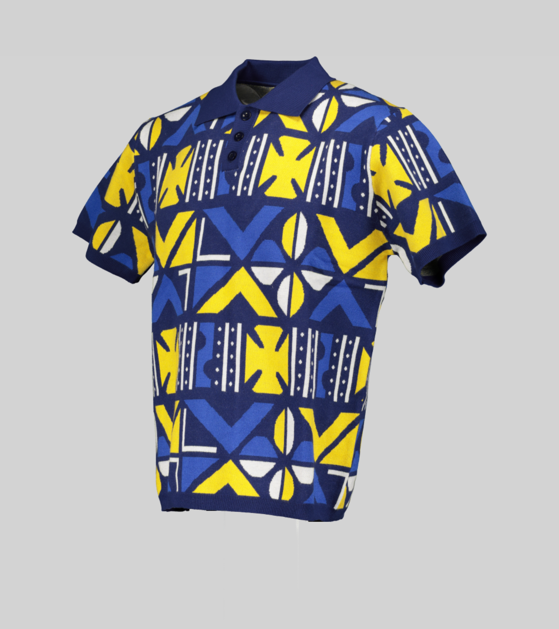 Blue and yellow cowry print knitted golfer with short sleeves, shown from the side.