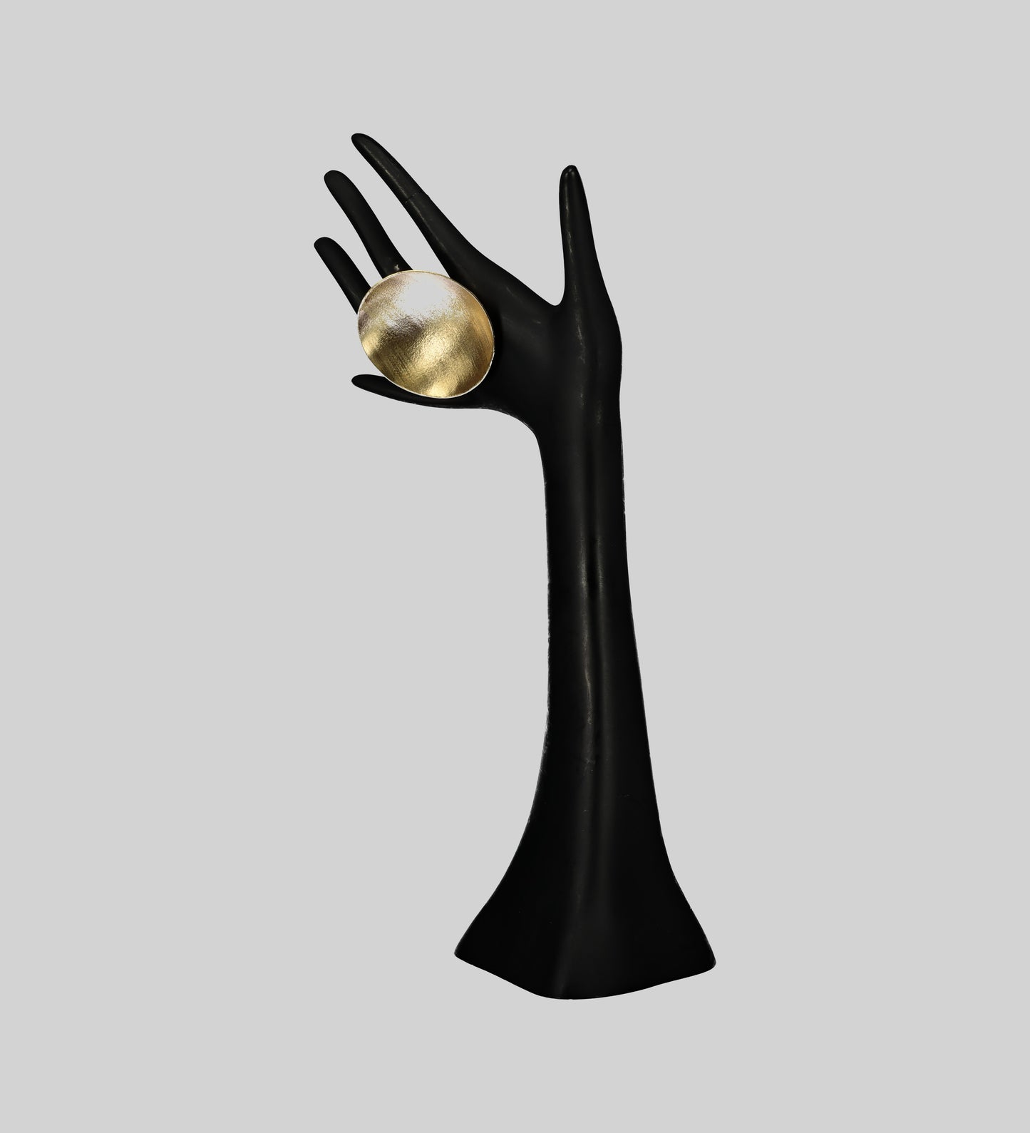 Ditsala Designs Gold Ring on a Black Hand Mannequin