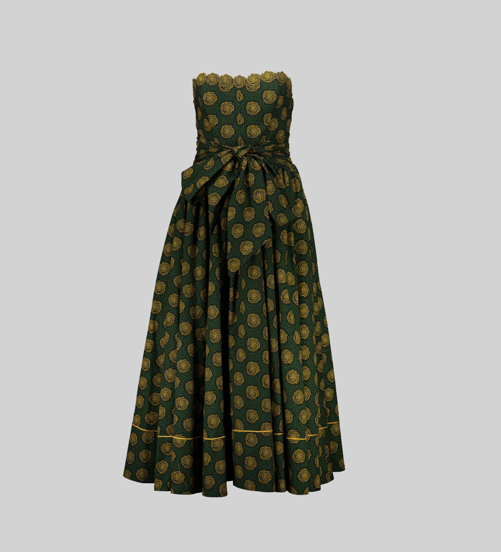 Green, yellow, and black seshweshwe boobtube dress with applique detail on neckline.