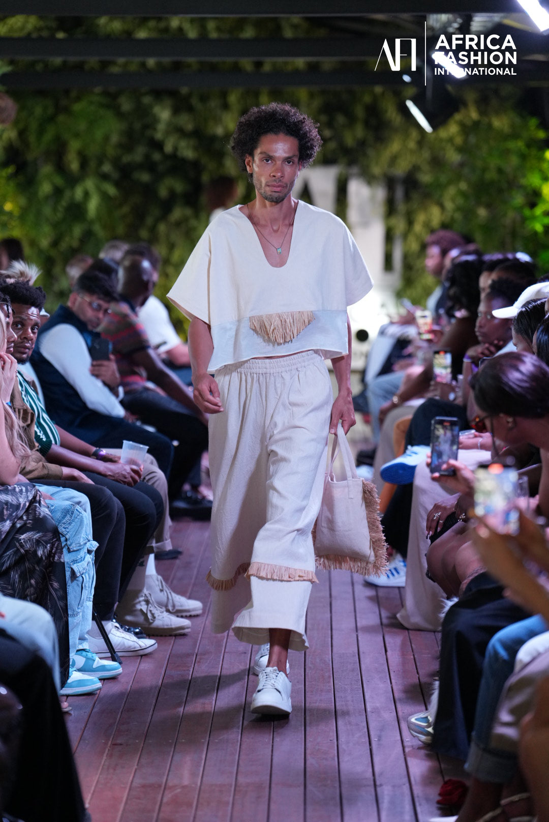 Model in A Raffia wide trousers