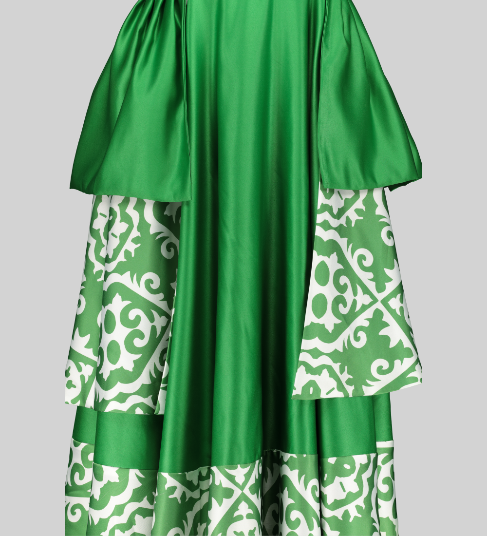 Tumi Captivating Green Dress. A flowing tiered-flare dress showcasing a captivating green and white print on luxurious printed satin